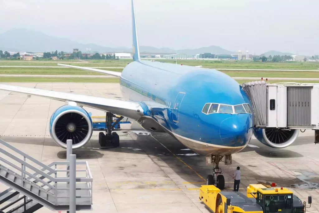 a blue color airline stand on airport runway