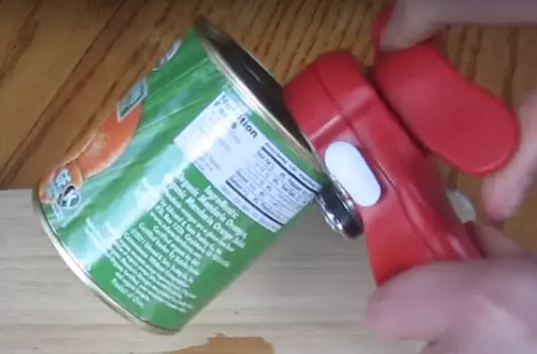 cutting can with red can opener